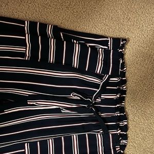 Dressy pants, with navy blue, white, and red pattern.